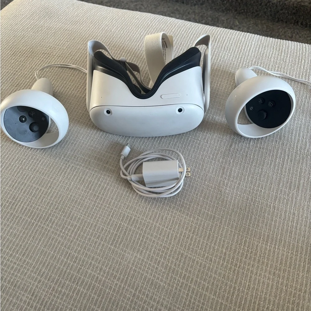 White VR Headset and Controllers - MetaQuest 2 includes charger.